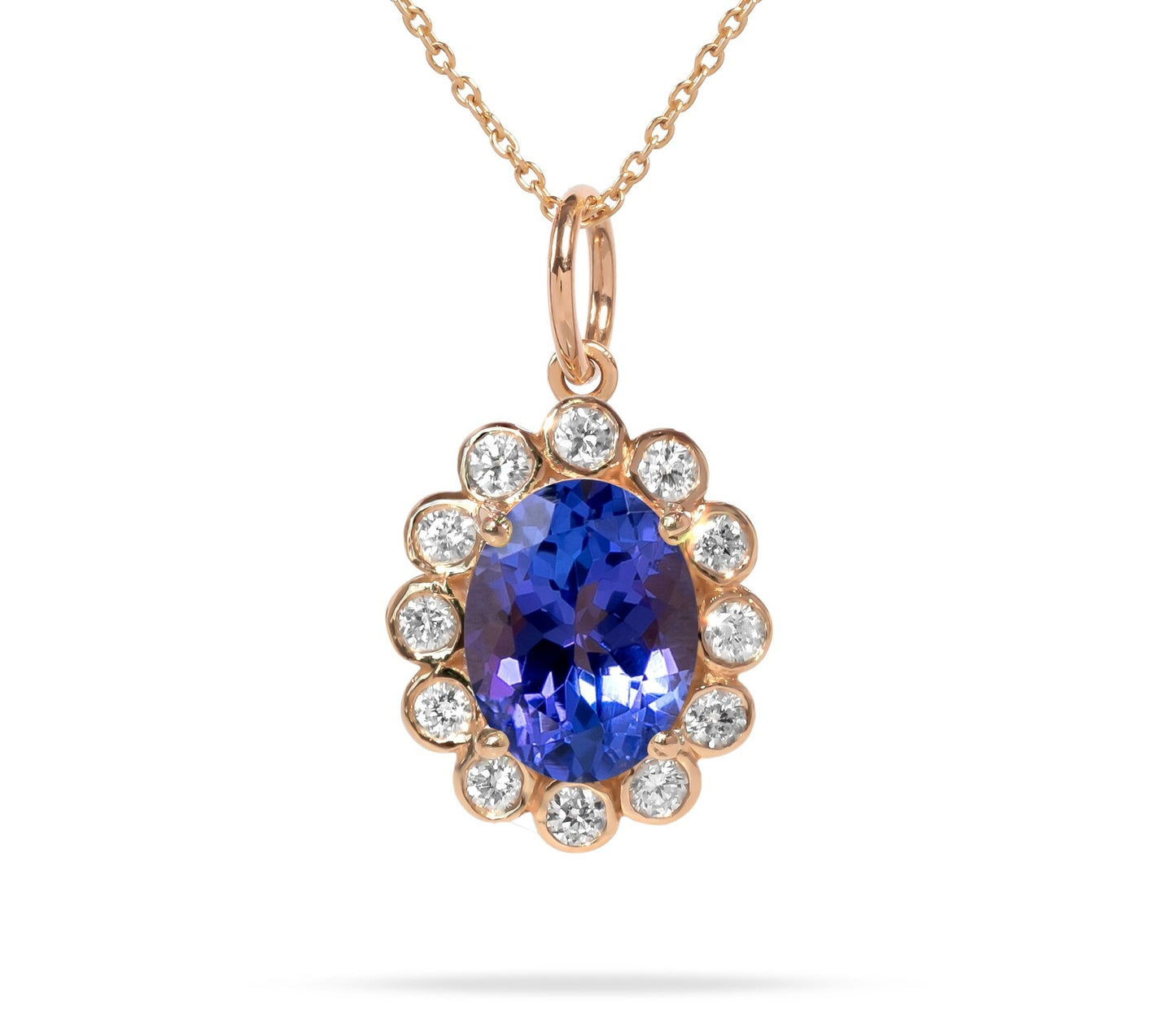 Elegant 18K Gold And Tanzanite Pendant with Natural Diamonds.