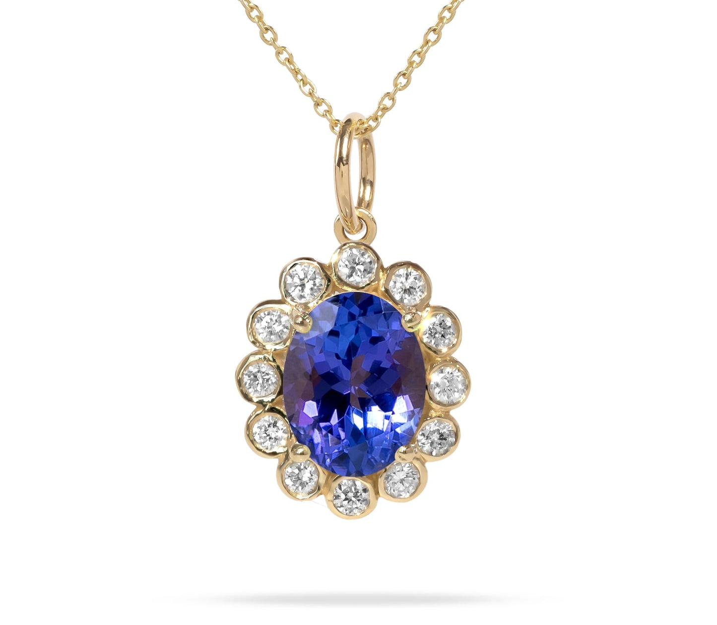 Elegant 18K Gold And Tanzanite Pendant with Natural Diamonds.