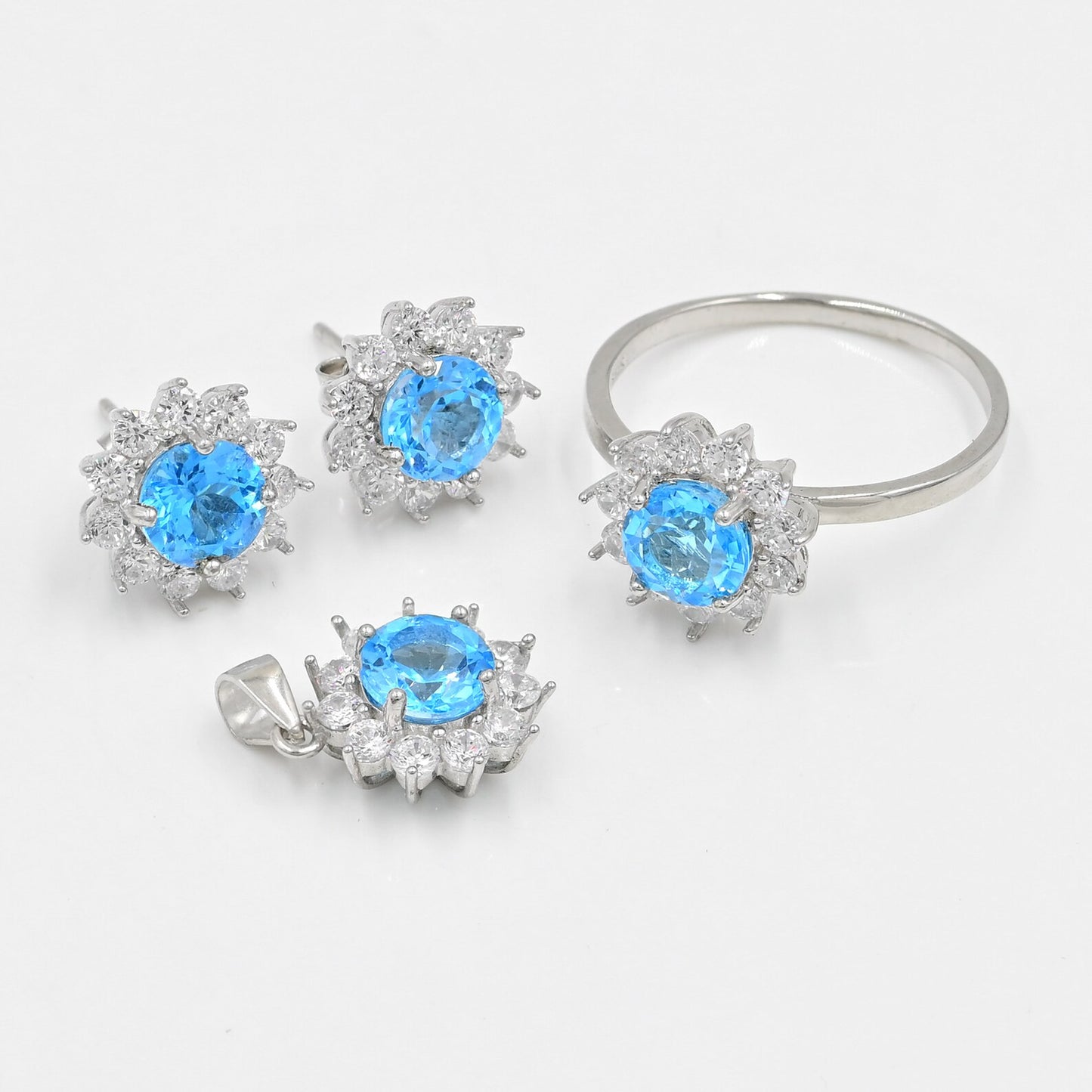 Natural Swiss Blue Topaz Jewelry Set | 7mm Round Faceted Gemstones in 92.5 Sterling Silver | Ring, Pendant & Earrings