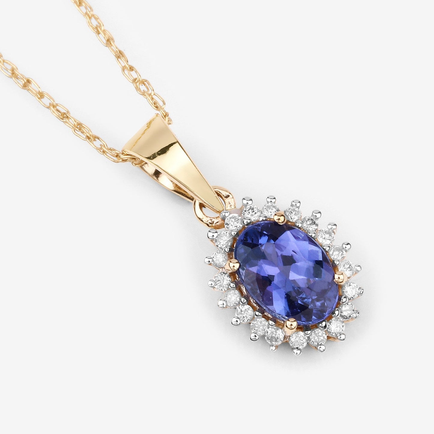 14K Yellow Gold Natural Tanzanite Pendant With Natural Diamonds.
