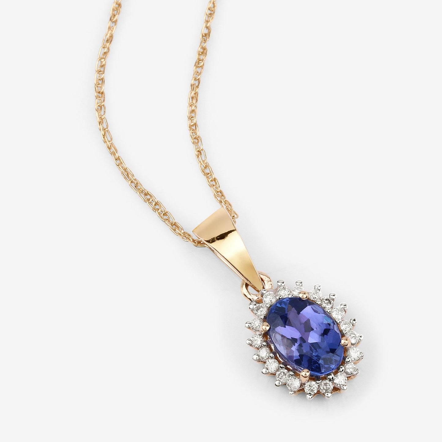 14K Yellow Gold Natural Tanzanite Pendant With Natural Diamonds.